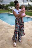 These pants are on point! They fit so nicely. I wore to a baby shower and I got so many compliments. The sandals pictured are also Lulus. If you are a little extra conservative, I would probably wear pins on the sides. Specially if you plan on sitting down. Worth every penny! I'm in love! - Irasema B.