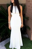 I loved this dress. It was exactly what I needed and it fit snug and was amazing. I had to have it hemmed because it was too long but after that it was perfect and the color was a true white. Really nice fabric that doesn't wrinkle. - Crystal L.