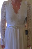 I love this dress! I was undecided on what size to get, but after reading the reviews I decided to go with a medium. It fits perfectly! However one more inch and it would have been a bit tight. It's absolutely perfect for the little country/rustic wedding I'll be having in the spring. It's not really heavy weight so if it's warm I won't burn up, yet if it's cool I won't freeze... just perfect! The length is just right- it's long enough to cover my feet but not super long. - Jaimee O.
