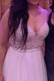 Wore this dress as a second dress at my wedding. Received many compliments on it! It was easy to dance in, and I wore flats with this dress. The beading is absolutely beautiful. When purchasing it, I was worried it may be too see-through but it was fine! So happy I bought this dress!! - Diana G.