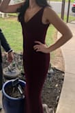 Covers everything you want it to and flatters the booty and the bust! I am usually between a medium and small - I ordered one of each and ultimately went with the small. Would order this dress again in a different color for another occasion! - KAYLA B.