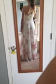 Wore it for a couples shower. Was still a little long after I put on heels. Got it hemmed and it's perfect now. - Angelina S.
