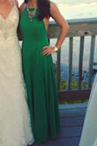This dress is gorgeous from the way it fits and flows to its stunning green color. There is so much fabric on the lower half, but it wasn't heavy at all. It's very flowy and breathable. I did have to have it hemmed because I'm short and it was pretty pricey because of the amount (and type? I think) of material they had to hem off. I definitely don't regret it though because I absolutely love this dress. Your waist measurement is very important in picking a size because the waist area on this dress has absolutely no stretch, otherwise, I think it is pretty flawless. This is my very first purchase from Lulus, and the reason I kept coming back. - Ariane J.