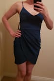 This dress is true to size. I am in between an XS and a S with Lulus and the size S was perfect for this dress. The color is more blue than what is shown in the picture, but it is still gorgeous. This dress does not have a zipper, you just slip it over your head. I absolutely love it and it looks great with some major statement earrings! - Marissa V.