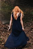 I wore this dress for my engagement photos and fell in love with how pretty/comfortable it was. I love the slit in the skirt to add some sassy vibes. I also love the fact that I don't have to wear a bra with it. I ordered a medium because I was worried about it being long enough (I'm 6 feet tall), but I think I probably could have gotten away with a small. I just safety pinned the sides from the inside, and it worked out just fine! Three of my bridesmaids are going to wear this dress in light grey for my wedding! Highly recommend. - Rachel P.