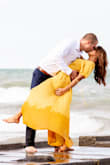 I bought this dress for my engagement photos - let me tell you, they could NOT have turned out more amazing! I am getting married in Punta Cana and wanted a location/outfit that reflected our beach-themed wedding. This dress is everything I wanted and more. It was a great fit but comfortable to move around in throughout the entire shoot. I also loved how much it popped in photos and have since been able to wear it as a guest for other weddings I've attended. 100% recommend! - Rachael T.
