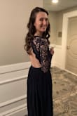 I am in love with this dress. I wore it as a guest to a wedding and I want to wear it a million more times. The open back is so pretty and the lace sleeves made it perfect for this winter wedding! - Susan G.