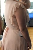 I fits perfectly length wise, but too small on the top. I wish it was a little bigger to cover the chest area. The color is more peachy than blush pink. - Alexis H.