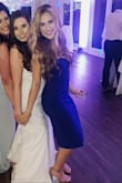 This dress is perfect! Great material, thick enough to cover lumps and bumps, didn't even need spanks! Got lots of compliments!! I want one in every color! - Megan T.