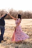 I tend to always order up when I buy Lulus because I'm broad, I ordered a large and it fit perfectly! The material was soft and comfortable. The slip was well placed and it flowed well! It's a little more low cut than I'm comfortable with but I had an excellent photographer that helped me with angles. - Cecilia E.