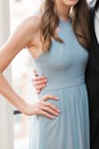 I wore this dress as a bridesmaid dress, and it was my favorite to date! It fit perfectly, requiring no alterations and was so flattering! I received tons of compliments on this dress. It was flowy and not too heavy/hot for a summer wedding and perfect to dance in. I could definitely see myself buying it in another color for future formal events. The quality is fantastic and the price is unbeatable! I would definitely recommend this dress for bridesmaids, proms, or formal/black tie events. FYI: The beautiful color is more similar to the individual picture than the group picture. - Christina H.