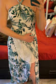 Nice flowy material with a short liner to prevent it from being see-through. I love that it's a wrap as well, so you can custom fit it to your size/ shape. The only thing I'm not 100% sold on is the print. It definitely looks like the perfect beach vacation dress, but it might be too much tropical print for any other occasion. - Lara S.