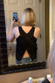 This top is awesome for a night out or a concert but I don't see how anyone could wear a bra unless it is cut low. I tried it on with a full coverage bra which you can see in the pic. Will return because I just don't know how I could make this work with my abundant selection of bras. - Sarah B.