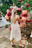 Love this dress! I did have it taken in a bit at the stomach but this was PERFECT for my shower! - Brittany P.