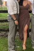 I originally ordered this dress in a medium and it was too large (at the bust/armpit area). I loved the style and color and re-ordered in a small and was thrilled! The small fit perfectly snug - I wore it with a strapless bra - and when I recently attended a wedding in Fort Myers, Florida, I was thrilled with how the dress looked and felt. 10/10 would recommend!! - Kiera S.