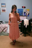 This dress will be perfect for my Graduation ceremony. I can't wait to wear it in public. You can wear it with flats or booties. You can adjust the skirt however you want it, like unbuttoning some buttons to make a slit on the front. It's a little loose, I could've gotten away with a M, but I'll keep it just in case I gain weight again hehe. I love how there's these closures in between the buttons for extra closure. Problems with big boobs and buttoned shirts, there's always the pick-a-boo hole in the middle wishing there was a button to close that up, and this top has that! The only thing I don't like is the buttons are tough, it's hard to unbotton. I probably should've gotten the black one tho, it would look better with my skin tone. Overall, it's cute! ...and omg it has pockets!! - Stefi M.