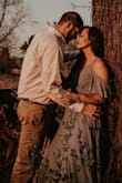 I wore this dress for my save-the-date pictures! I absolutely love it! It was so flowy and draped beautifully whether I was standing or sitting. So girly and elegant! It's a wrap dress so you can adjust the fit to your comfort. I definitely recommend it! - Helen M.