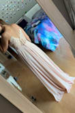 I originally got this for prom, though I found another dress that was more for prom. Though I loved the back of this dress it did seem a little loose in the bottom of the design on the back though was only noticeable to me. HIGHLY RECOMMEND. - Elaina L.