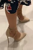 These heels are very cute! I have already wore them twice. The arch does make it feel like you ate walking on your tip toes but if you aren't going to wear them that long they should be fine. - Tamica B.