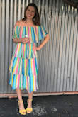 I normally wear a size small but listened to the other reviewers and ordered a size smaller, and the XS was perfect for me. At first I thought this dress was too unflattering, but the rainbow colors brought me so much joy, I wanted it anyway! And it turns out it looked way better IRL than in my bedroom mirror. I have fairly big boobs, so strapless is usually hard for me. Not so with this dress as I was able to wear a black bandeau bra and everything held up; nothing showed through. I wore this to a wedding and received compliments all night. And it's so fun for dancing!! So so glad I bought this!!! - Rebecca P.