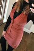 This runs tight. Fits good in the chest. A bit tight but it could be me. I usually don't wear fitted clothes. I did not size up or down and wouldn't. - Olga B.