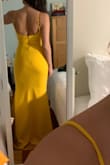 I've been looking for a yellow dress like this for some time now, and I was so happy when I found it. This dress is perfect for a spring wedding I'm going to. Unfortunately, I waited a little too long to purchase my actual size (small), but I gave the XS a try, and it was perfect. I just need to tailor the bottom a bit but nothing major.
Ladies: always try two different sizes because you never know! Adjusting the straps made it work on the chest area. Can't wait for this wedding :) - Livia P.