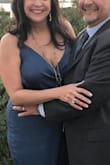 I purchased this dress for a special wedding. I didn't want a long dress, but I wanted something beautiful. The color was gorgeous.. my husband loved the dress. I received a ton of compliments. The dress fit great and has great movement. It has a very luxurious feel to the material, not too shiny, but just enough sheen to the material. love this dress, will wear it again, first chance I get. - Catherine M.