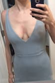 I usually wear a size 4 so I ordered the small. It was both big in the waist (see full body photo) but then also too short in the torso. When I pulled the waist down to my natural waist (see bust photo), it was cleavage central. Definitely not for my shape. I have an athletic build and it didn't make me look and say "wow!" Thick, stretchy fabric, so if you want this to be tighter (as the mermaid probably should look...) then you'll need to size down. - Anthony S.