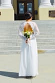 I had been eyeing this dress for a couple of months. It turned out to be perfect for our impromptu wedding. The dress fit perfectly and was shipped promptly. I had a few items that need to be fixed including the length. The sleeves were long so a layer of the scallops were removed, and the sleeves were big in the armpit area so the sleeves were tightened. Final result was perfect! - Yanira R.