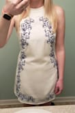 This runs really loose so order down unless you want it very flowy/loose. After I altered it it's really cute. - Julie B.