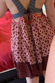 This was just... a little awkward. First, the waistline was too high for me, which seems to be the case in some of the other photos as well. Second, wtf is going on in the back?! It laces but, but NOT at the waist, then there's a bunch of gathered material poofing out of the Middle of you back. 
I loved the print, and it's a nice thick material, but the fit just didn't work for me. - Lara S.