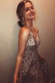This dress is beautiful and is SO true to the picture. I love the sparkles and glitter! The only thing is that the glitter does get everywhere but other than that it's a gorgeous dress and I can't wait to wear it for prom! - Savanna S.