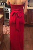 I originally bought this dress in x-small red because it was on sale and it fit well but it would've needed to be altered in multiple places. I didn't really love the color on me so I bought an x-small black instead and it fit a lot different but in a good way. It doesn't need to be hemmed and it fits tighter in the waist area, however I may need to have it taken in at the chest because it's still somewhat loose there (I'm a 32a). Overall it's a very pretty dress and I love it and can't wait to wear it! - Sarah O.