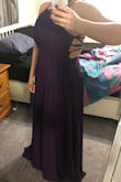 So I absolutely love the color, but I'm not crazy about the style. It is true that it takes two people to get it on and off. The straps get tricky. Maybe I just need someone to mess around with them, but it's not very flattering. My body almost feels boxy in it? Not my favorite but it'll do. - Nicole M.