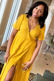 The dress is light and fun. Beautiful color. Ordered an XS so the dress does run big because I'm usually a small medium. Wore it to a bridal shower. Would totally recommend. - BreAnna S.