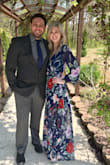 This dress is beautiful - high quality and falls just right. Be aware, it is long. I'm 5'8" and with heels it was plenty long. Short girls will likely need it hemmed. Also, fashion tape is a must on the bust. If you are small busted you may need a stitch to close the bust up a bit. It would be worth making these adjustments to wear the dress though. It is a show stopper. I wore to an outdoor wedding in the south in April and was very comfortable. - Laurel E.