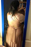 I was looking for a bridesmaid dress in blush pink. All the girls in the wedding party said they were going with Lulus so I want to get one to match the color. The material was high quality, and I was happy that the XL could fit me. I normally wear a size 14-16. I thought there would be a way to configure this dress to be able to wear a bra with it, but there just wasn't. If I was covered in the back, then the band shows in the front. If I covered the front, the material didn't lay right. My fiance and I tried for awhile to follow the tutorials on how to wear it, as well as come up with our own ideas and in the end there was just no way that I was comfortable with it. I returned it at UPS with the return label that was provided and took LuLus credit for it. 3 stars because the quality was good, it just didn't work for me. - Danielle K.