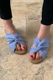 I love how comfortable these adorable twisty slides are. The color is vibrant yet still neutral and I plan to wear them all summer! - Carla B.