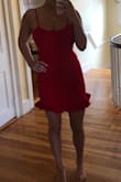 I love this dress I got a size small and it fits perfectly!! Perfect for summertime the bright color looks rlly great! The only thing I don't love is the ruffle at the bottom sticks out pretty far but that might just be me, overall super cute I love and very supportive! - Molly O.