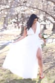 Wore it to my civil union ceremony in Central Park and it was perfect! Got compliments from nearly from everyone that passed by me.
I also plan on wearing it to our honeymoon with sandals to go out!
I'm sure who ever buys this dress won't regret it! - Natalia D.