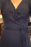 The blue color on this dress is so pretty, but I wasn't able to wrap this one a tightly as other Lulus maxi wrap dresses. There is also a button on the bust of this dress which covers well but made the front look odd on me (small busted). - Ceara C.
