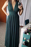 I bought this dress for a special occasion event and it fits perfectly! I'm 5'3 and it is the perfect length with 4 inch heels. The only thing that bothers me is that the zipper gets a little stuck on the way up, but other than that, it's great. Also, the quality of the material is amazing. I can't wait to wear it!! - Carmina P.