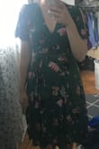 This is a comfortable yet elegant dress that could be dressed up or down. The wrap cut is super flattering and can be adjusted to fit your frame. I am normally a small on top and a medium on bottom. The small in this dress fit perfectly. It hits me slightly below the knee, making it an appropriate dress to wear to nice functions. I also love the flutter sleeves that open on the sides adding a bit of whimsy. The only negative I see is the dress arrived very wrinkled so it may not do well on a long trip! - Colleen W.