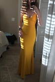 I am always nervous about ordering dresses online since I am so tall. This one fit perfectly and I had room to spare at the hemline! I am able to wear heels and the dress still hits the floor. I am obsessed!

(First photo is dress without heels, second is with heels) - Renee W.
