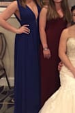 Wore this to my Cousin's wedding in Newport. Fit perfectly snug around my waist, sooo flowy loved the slit and twirling. Literally felt like a pretty blue goddess. The top was worrisome because of how plunging it is in the front and the back, felt like if I relaxed my shoulders it would have fell off and I would have flashed everyone. Definitely recommend fashion tape to prevent that. I also wore some adhesive bust lifters since it really doesn't have much support. I also felt like the shoulder width was too wide. Would have been more flattering if it was smaller, and if the length from waist to shoulder was shorter to make the top tighter maybe it would prevent potential nip slip. Maybe I should have got a small but I feel like the waist would have been too tight. - Teryn A.