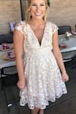 I loved this dress for my bridal shower! It was a little long for my taste (just to my shins), so I had it altered to sit just at my knees. It was perfect, fit so well, and was super comfortable. The v is a little deeper than I expected, but it was stunning! - Allison P.