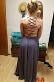 This dress was perfect. Amazing fit, iron very easily. Was a little long but fit wonderful. Definitely would recommend this. Bought it for prom but will wear it to a wedding in the summer. - Anna M.