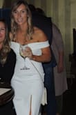 WOW. Bought this as a rehearsal dinner dress for my wedding and absolutely loved it. The fit is great, the material is thick enough that it is not see through at all (sometimes an issue with white!) It was classy, while at the same time fitting. Loved the leg slit as an additional feature! - Aisha R.