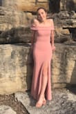 I wore this for my senior prom and it was perfect (if you go to a school with a strict dress code watch the slit because I got dress coded). The off the shoulder look is so stunning. It was easy to move in and was super flattering! I would highly recommend for prom/formal events. - Kate L.