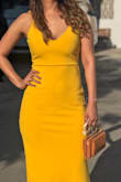 It fits perfectly to my body type, the color that I ordered was yellow, good style and fabrics, I totally recommend this dress for especial occasions. - Vannia H.